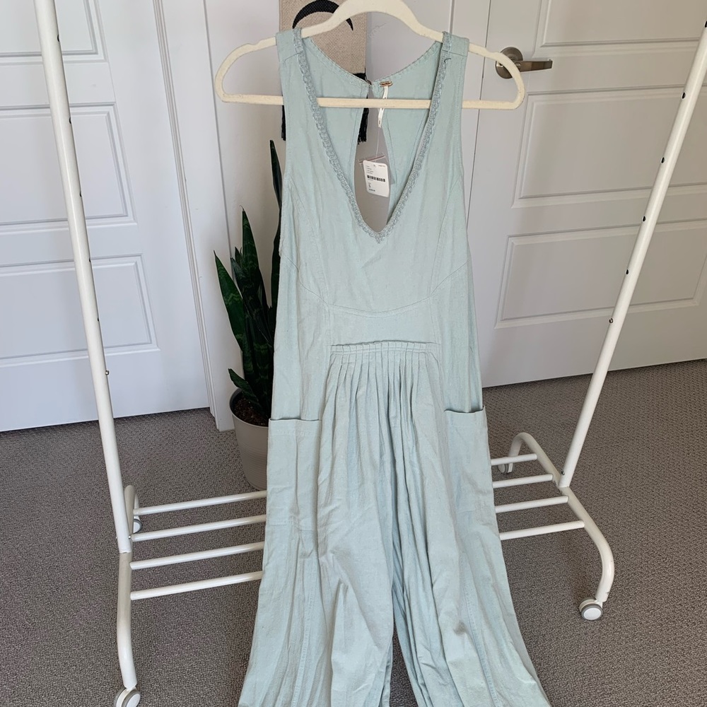 Blue free people jumpsuit, size small, never worn